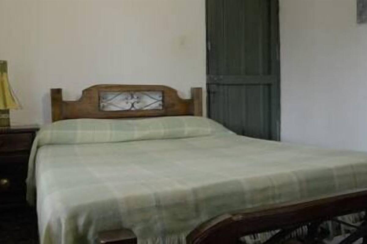 Habitación doble | Caja fuerte, tabla de planchar con plancha, ropa de cama