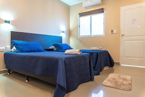 2 bedrooms, premium bedding, down duvets, memory-foam beds - Managua Apart Hotel (Puerto Iguazú)