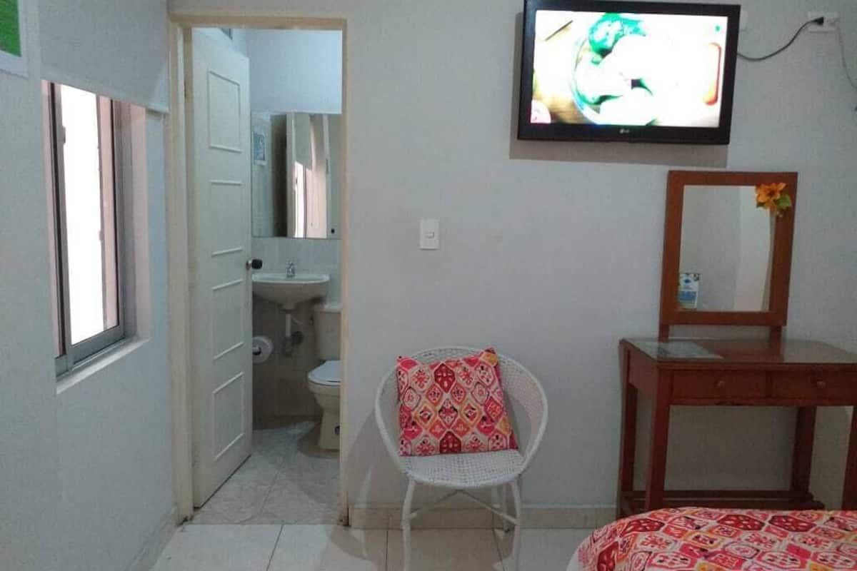 Desk, laptop workspace, free WiFi, bed sheets