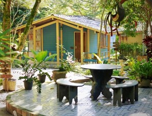 Traditional Double Room | Minibar, individually decorated, desk, laptop workspace - Pousada Tarumã (Mucuri)