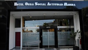 The entrance to Hotel Obra Social with a modern design, featuring a glass facade and a prominent entrance number 4037. - Hotel Osam (Buenos Aires)