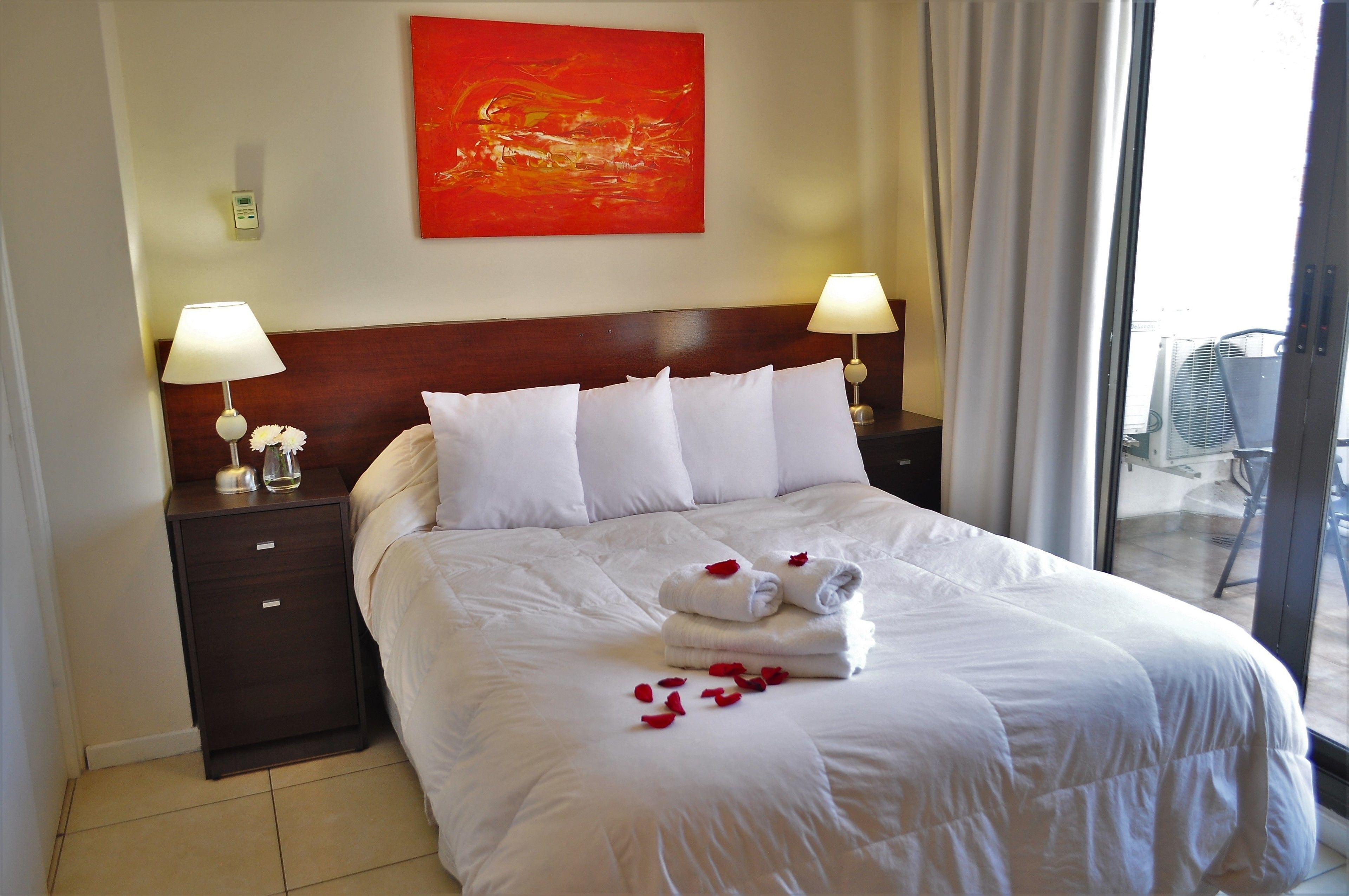 Premium bedding, down comforters, pillowtop beds, in-room safe