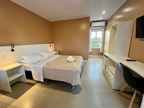 Deluxe Room | Minibar, blackout drapes, iron/ironing board, free WiFi
