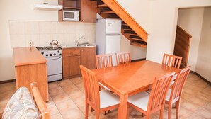 Family Bungalow, 2 Bedrooms, Private Bathroom | Private kitchenette | Fridge, microwave, stovetop, cookware/dishes/utensils - Cabañas Las Añañucas IV (La Serena)