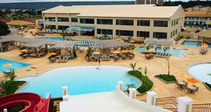 12 outdoor pools, pool umbrellas, sun loungers