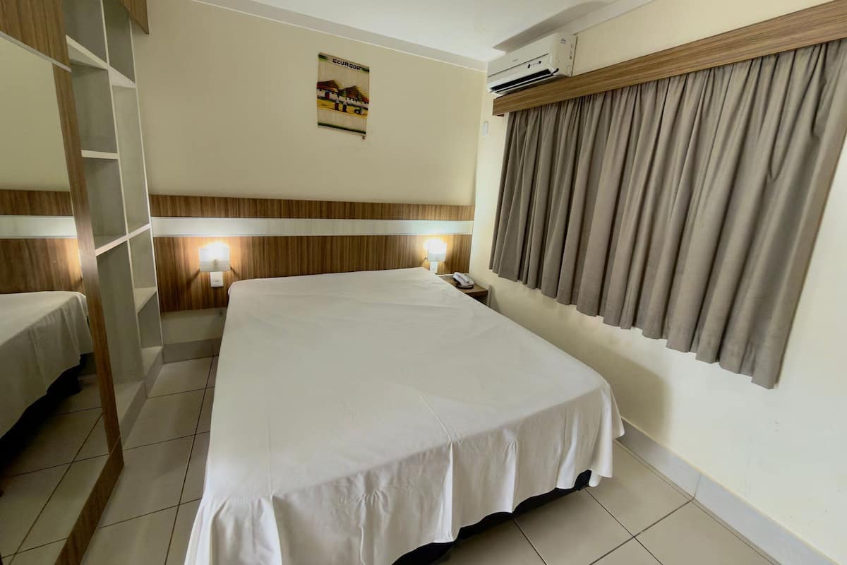 Appartamento | Minibar, tende oscuranti, Wi-Fi gratuito