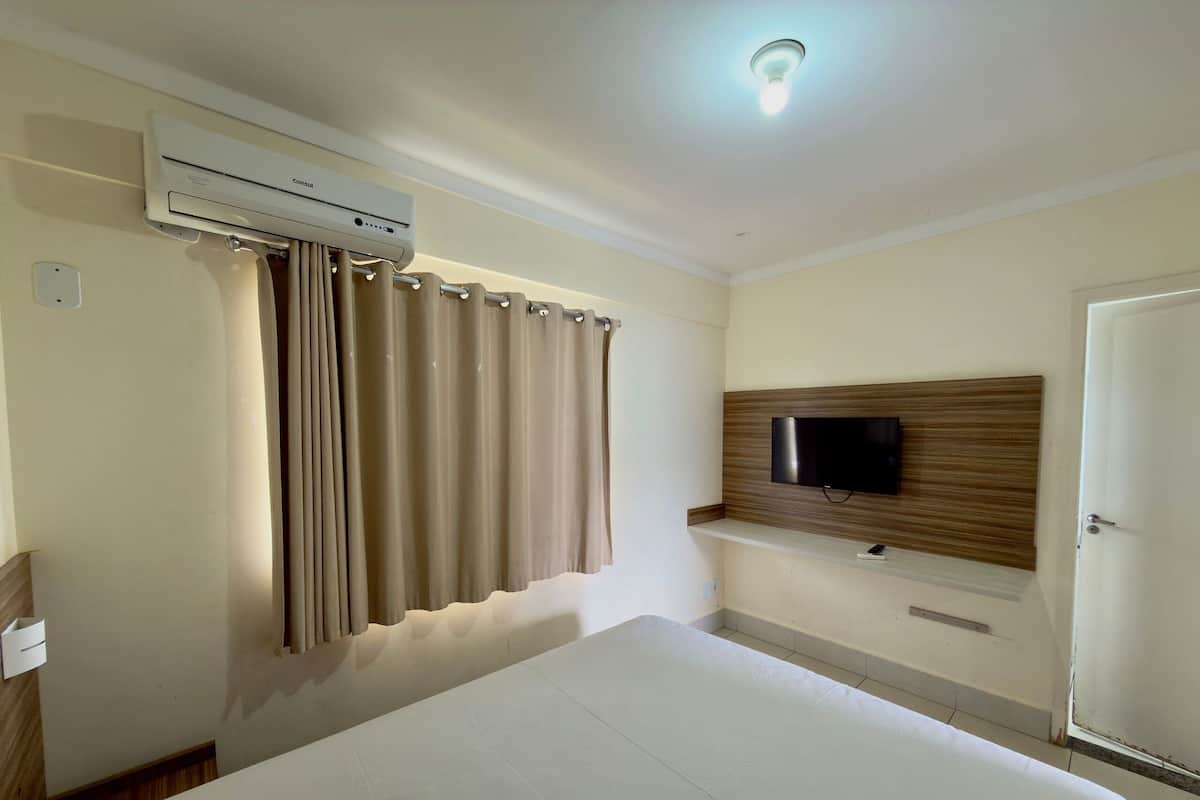 Appartamento | Minibar, tende oscuranti, Wi-Fi gratuito