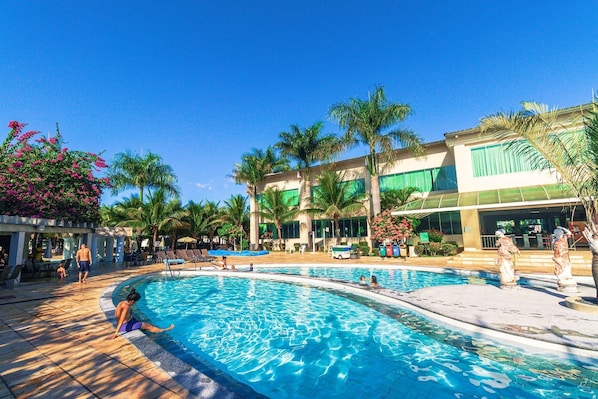 12 outdoor pools, pool umbrellas, pool loungers