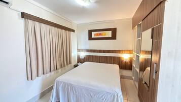 Apartamento | Frigobar, cortinas blackout, Wi-Fi de cortesia