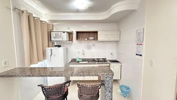 Apartamento | Cozinha privada | Micro-ondas