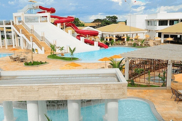 12 outdoor pools, pool umbrellas, pool loungers