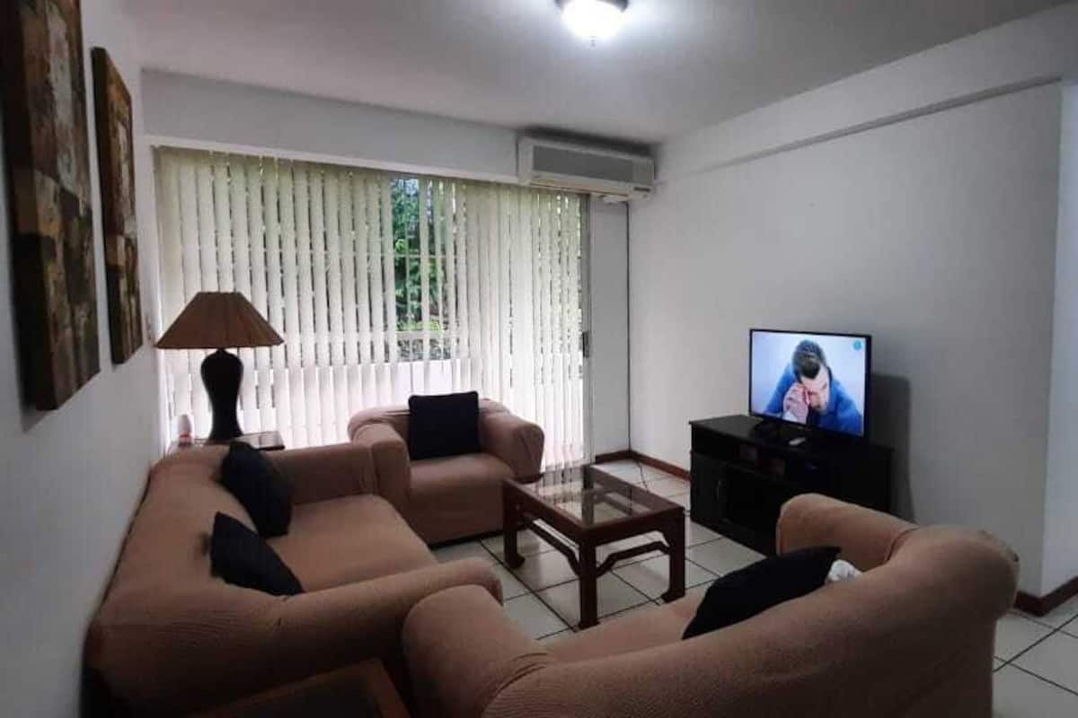 Family Apartment | Living area | 32-inch plasma TV with cable channels, TV