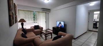 Family Apartment | Living area | 32-inch plasma TV with cable channels, TV