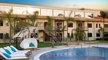 Outdoor pool, open 8:00 AM to 9:00 PM, pool umbrellas, sun loungers
