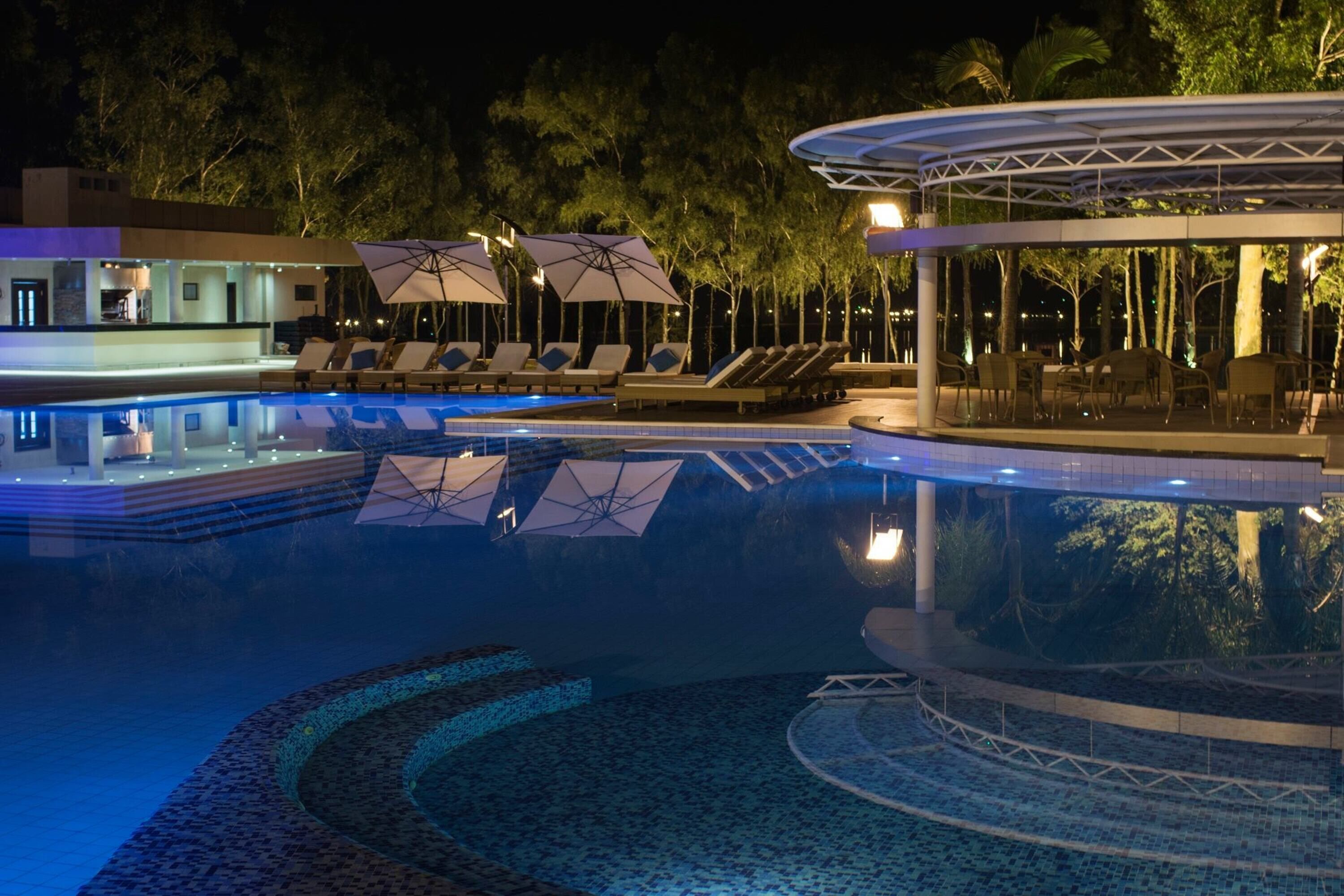 outdoor pool, open 8:00 am to 9:00 pm, pool umbrellas, pool loungers