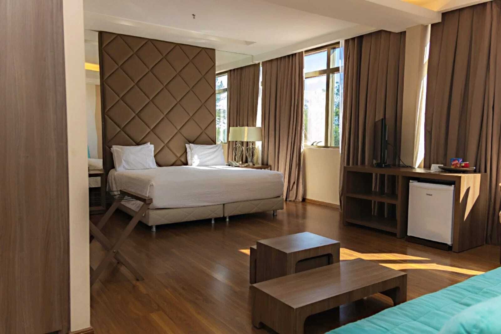 Executive-Suite, 1 King-Bett | Hochwertige Bettwaren, Minibar, Zimmersafe, Schreibtisch