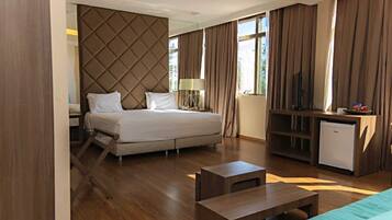 Suite ejecutiva, 1 cama King size | Ropa de cama de alta calidad y minibar