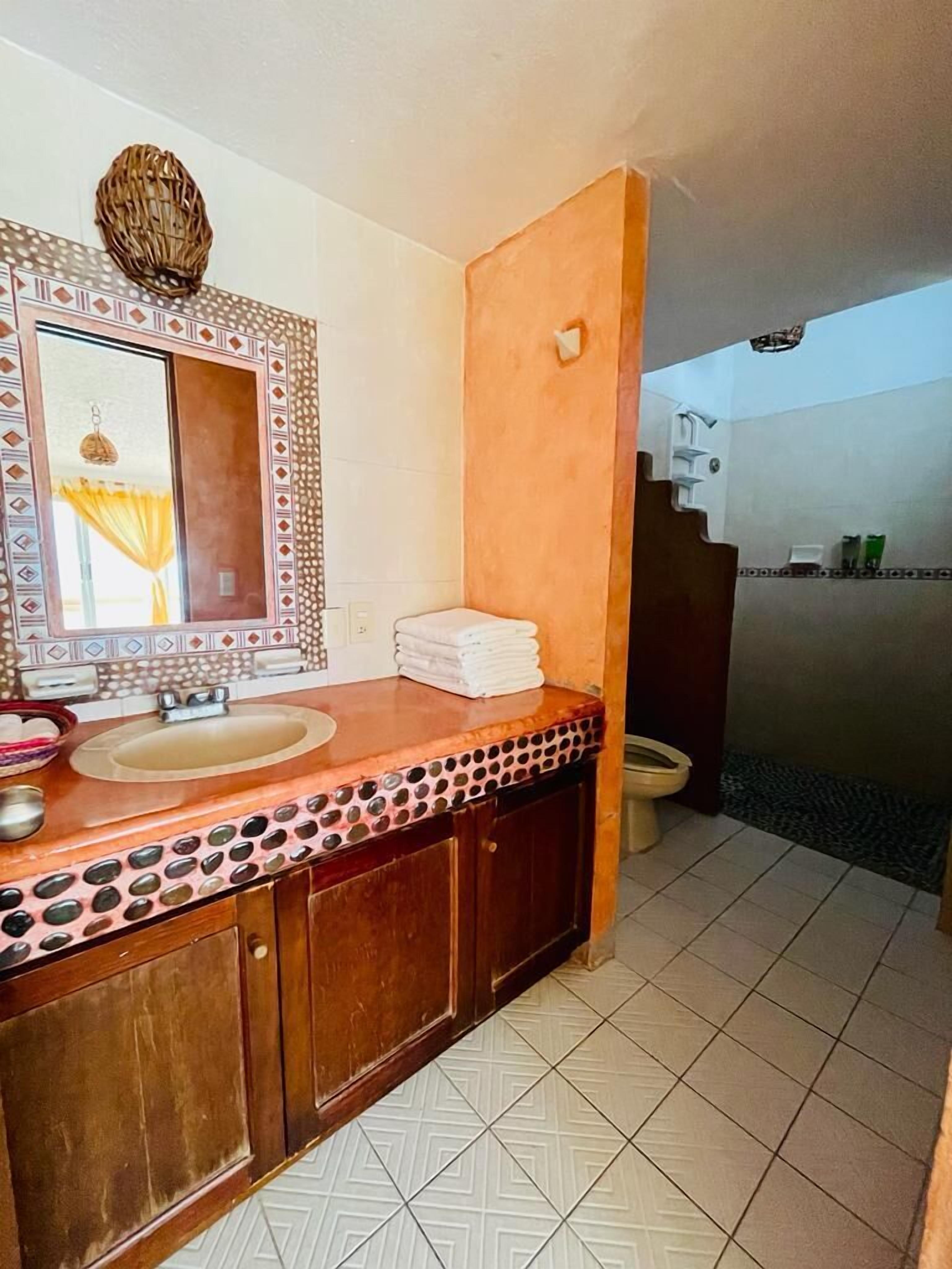 family room | bathroom | shower, hair dryer, towels, soap