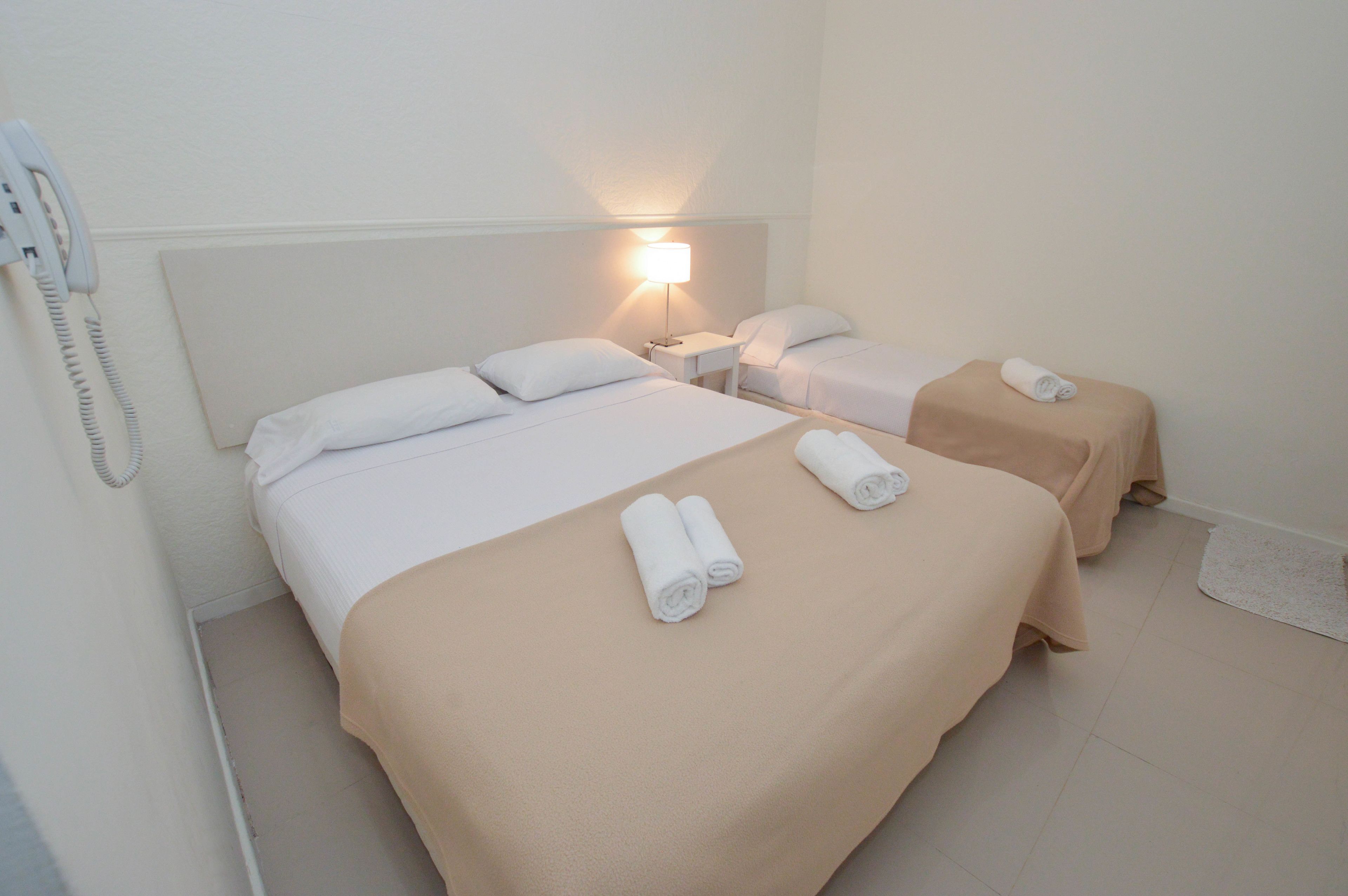 Habitación triple estándar | Wifi gratis y ropa de cama 