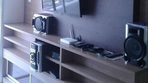 Apartment, 2 Bedrooms | Living area | Flat-screen TV, table tennis - Ajuricaba Suites - Morada do Sol (Manaus)