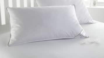 Premium bedding, down duvets, memory-foam beds, desk