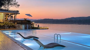 Outdoor pool, open 8:00 AM to 8:00 PM, pool umbrellas, sun loungers