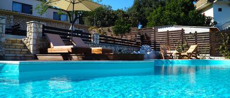 Seasonal outdoor pool, pool umbrellas, sun loungers