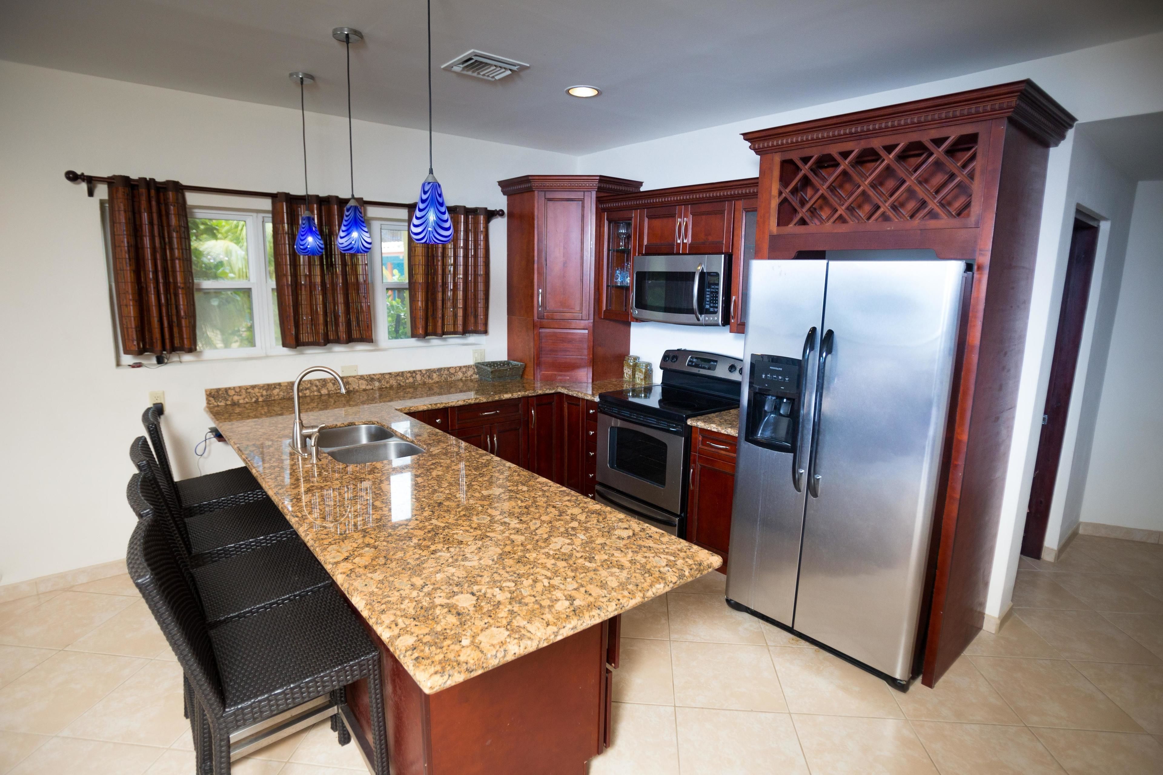 Condo, 2 Bedrooms, Ocean View | Private kitchen | Fridge, microwave, coffee/tea maker