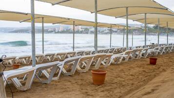 Private beach, sun-loungers, beach umbrellas, beach towels