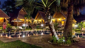 A resort with multiple villas, a swimming pool, and lounge areas. - Angkor Heart Bungalow (Siem Reap)