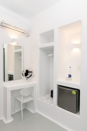 Luxe beddengoed, donsdekens, pillowtop-bedden, een minibar