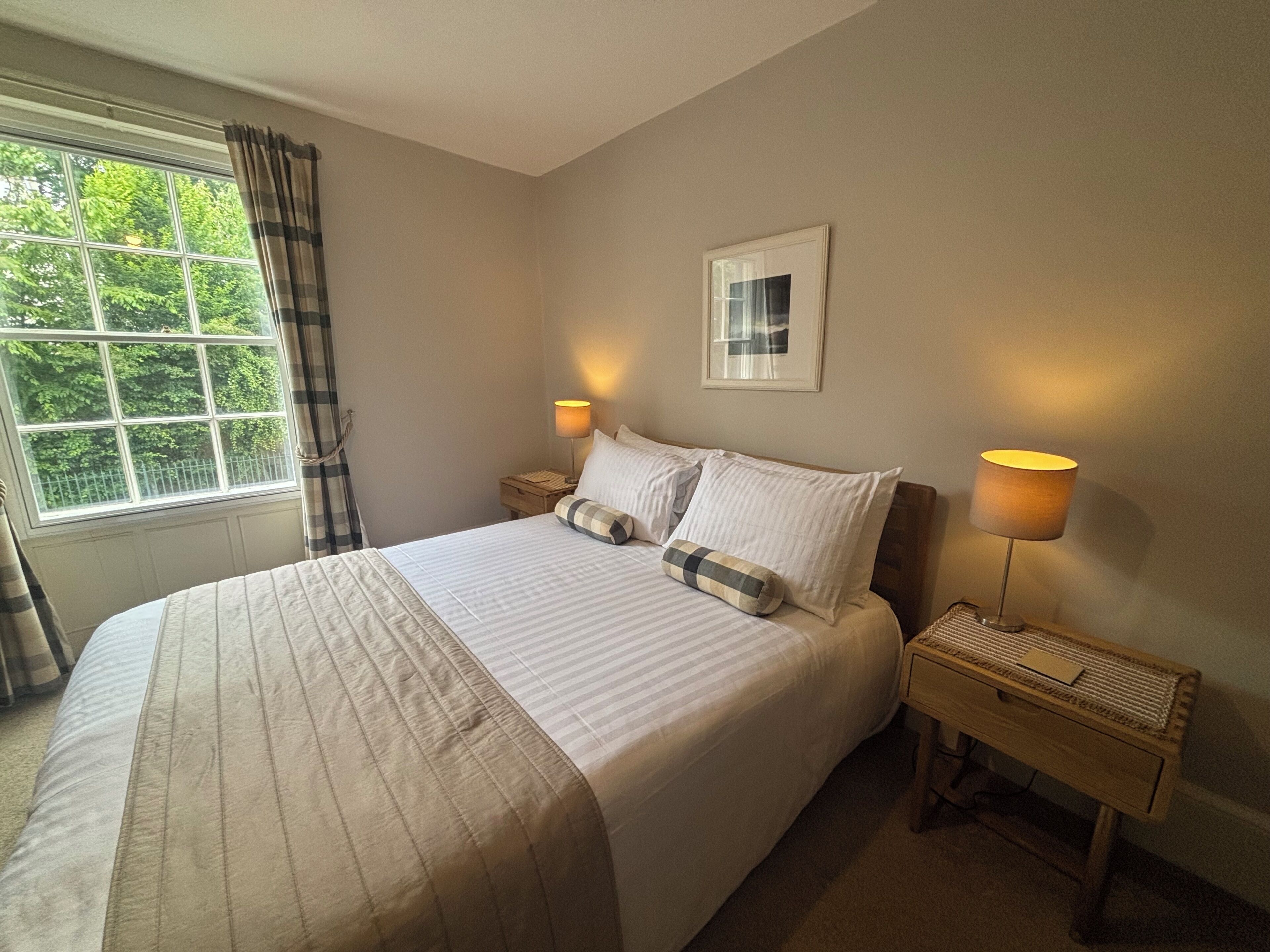 Comfort Double Room | Minibar, individually furnished, blackout drapes, iron/ironing board