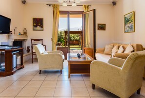 Villa, 2 chambres, piscine privée, côté jardin | Salle de séjour