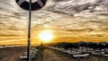 Beach nearby, white sand, free beach shuttle, beach cabanas