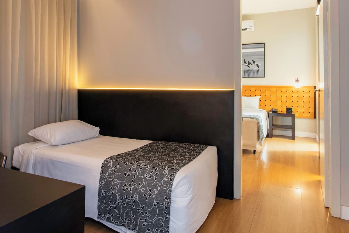 Tweepersoonskamer | Een minibar, verduisterende gordijnen, gratis wifi, beddengoed
