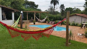 Outdoor pool, pool umbrellas, sun loungers