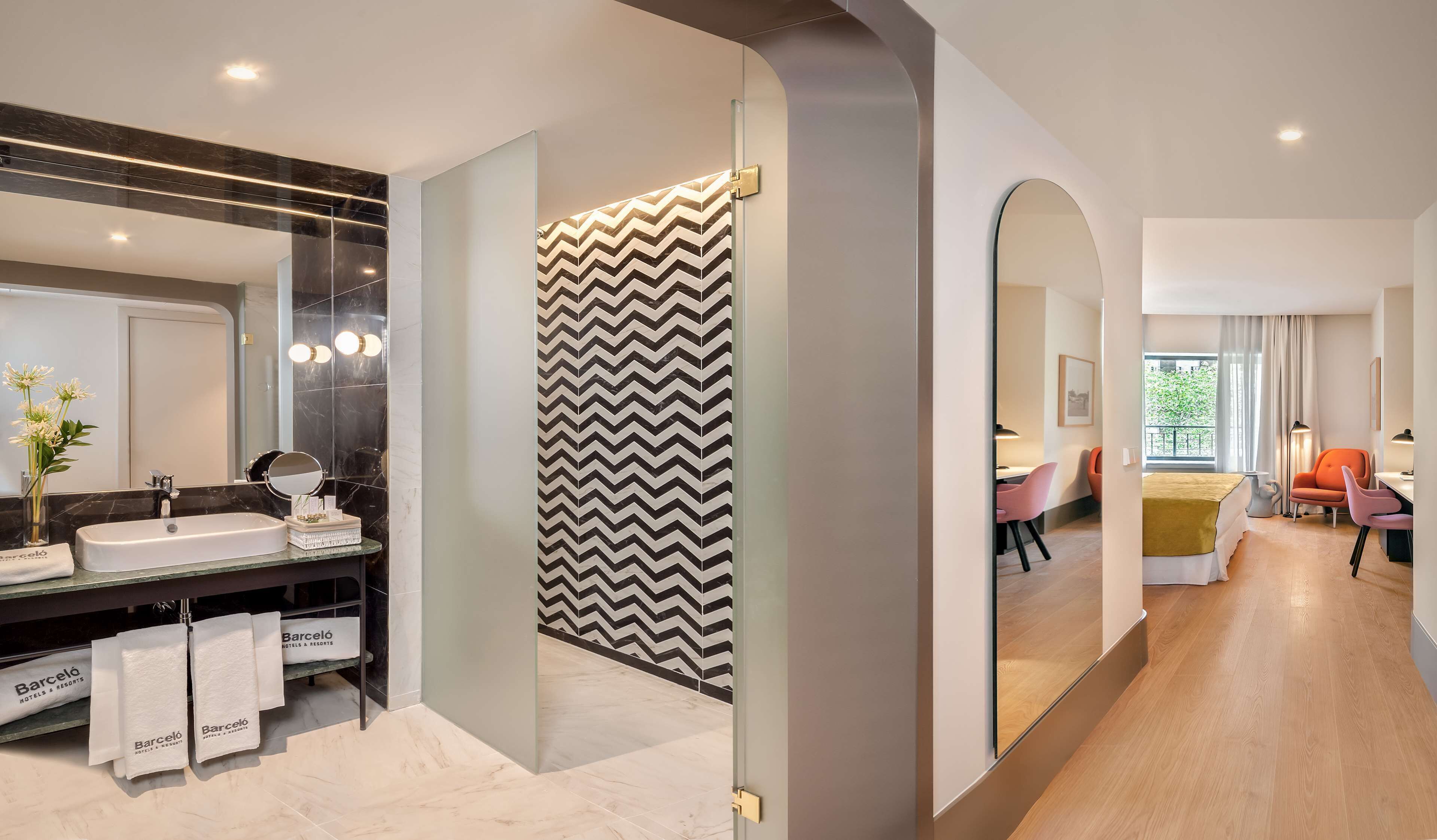 designer toiletries, hair dryer, bathrobes, slippers