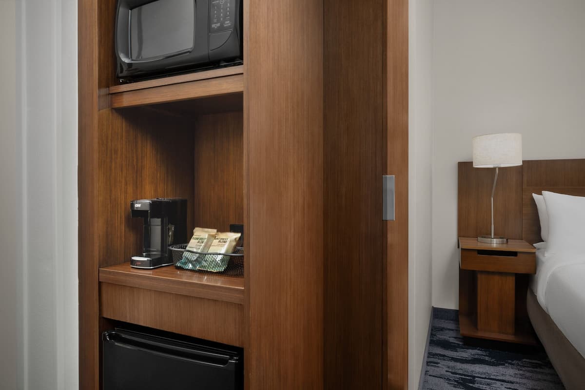 Desk, blackout drapes, soundproofing, iron/ironing board