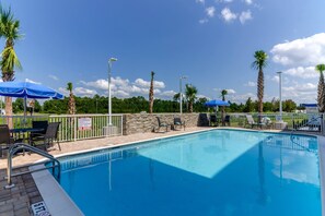 Outdoor pool, open 8:00 AM to 8:00 PM, pool umbrellas, pool loungers