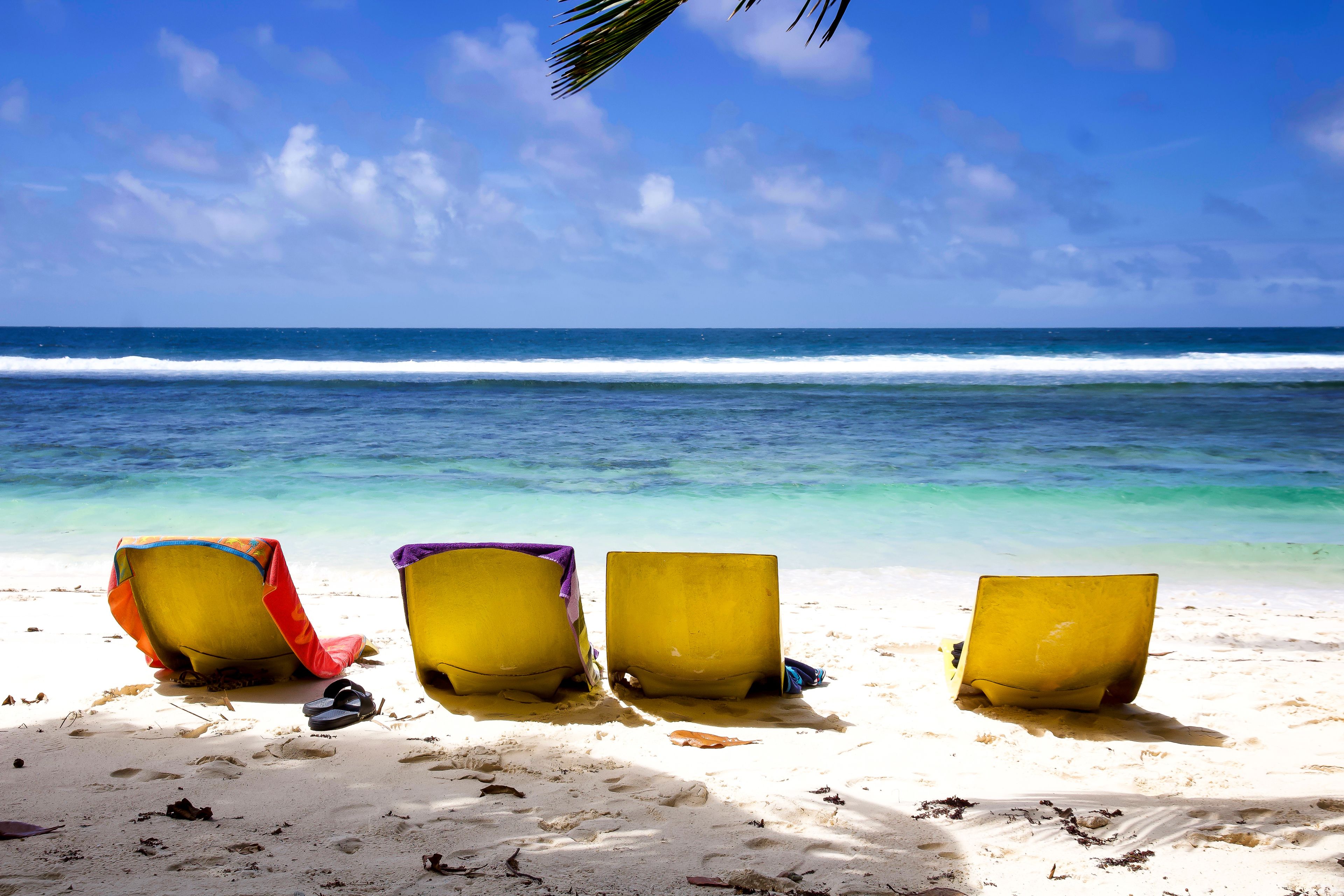 On the beach, white sand, beach towels