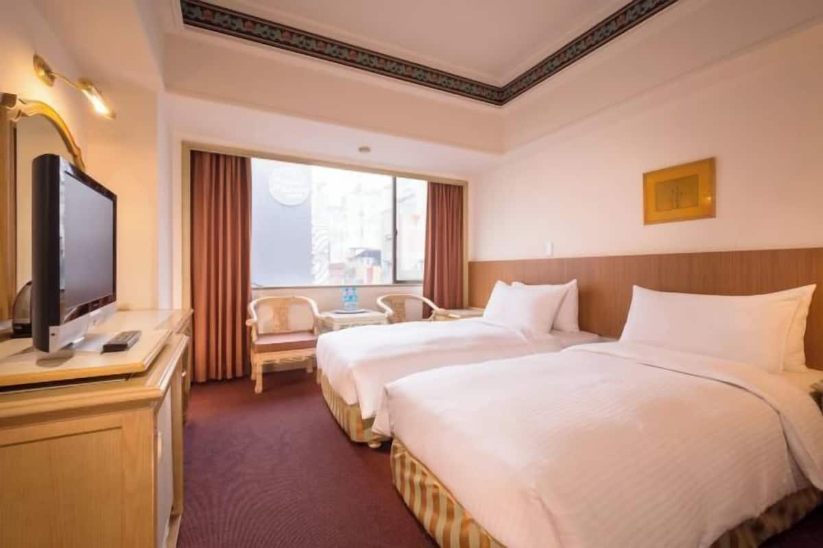 Desk, blackout drapes, WiFi (free), bed sheets