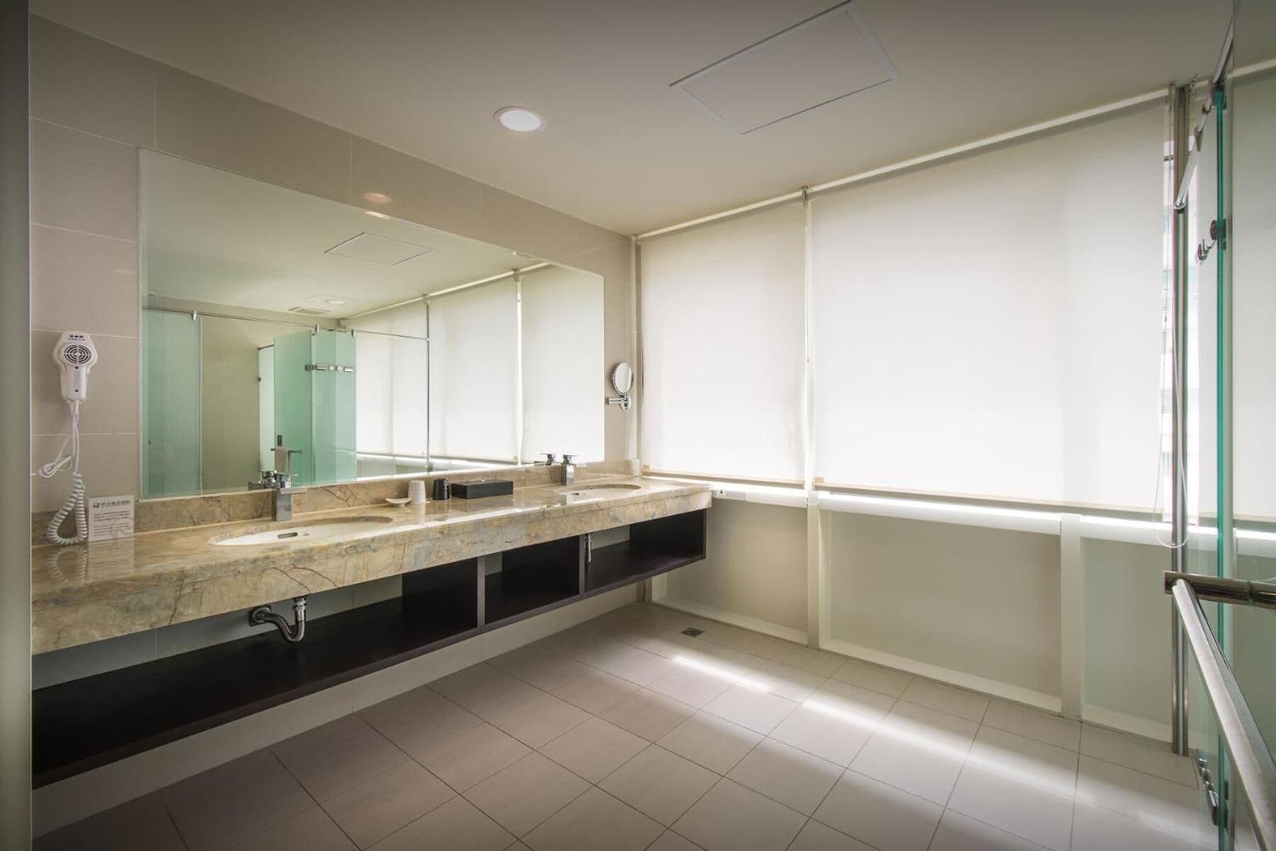 separate bathtub and shower, deep-soaking bathtub, hair dryer, towels