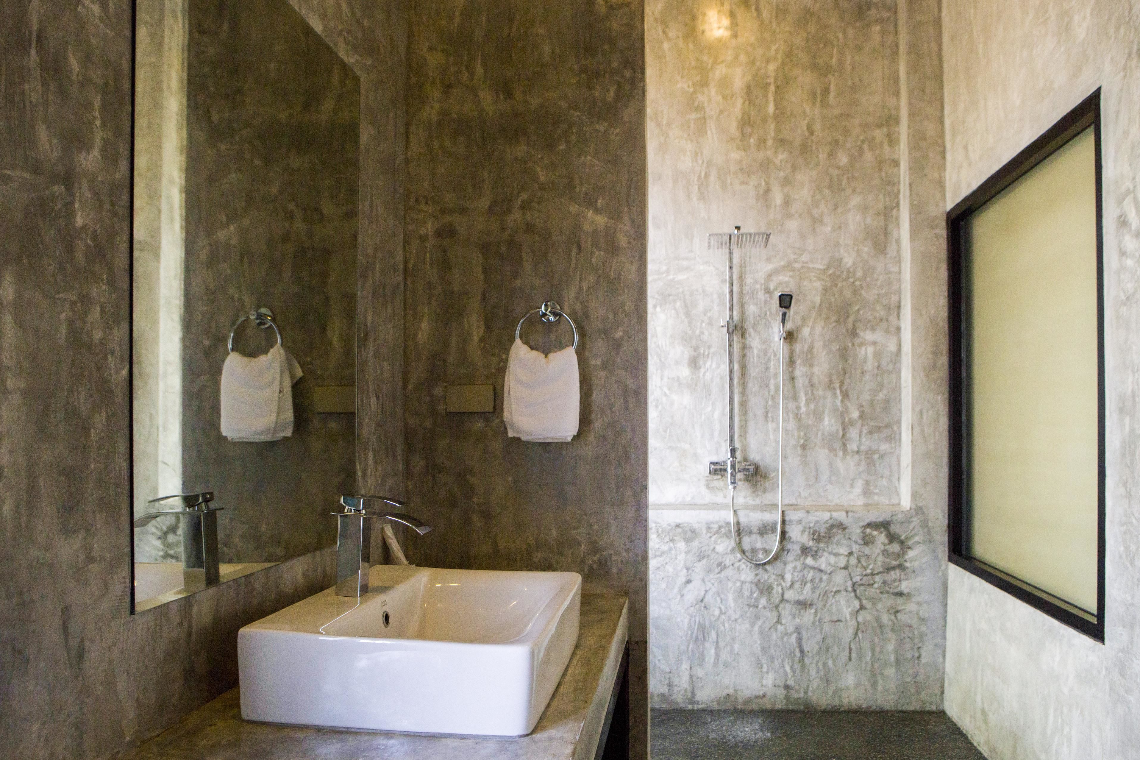 king room with pool view/garden view | bathroom | free toiletries, hair dryer, slippers, bidet