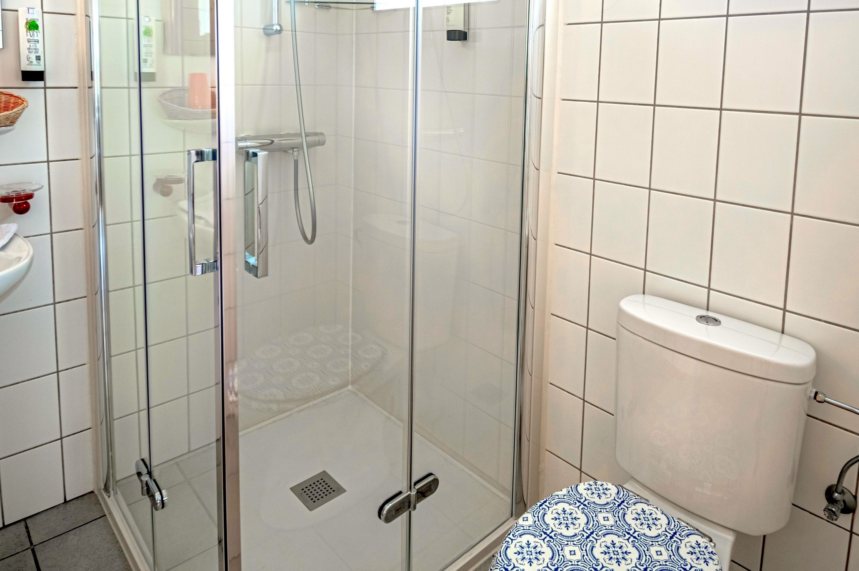 family room | bathroom | shower, free toiletries, hair dryer, towels