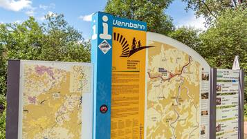 A map with a blue and yellow signboard, including a logo and text.