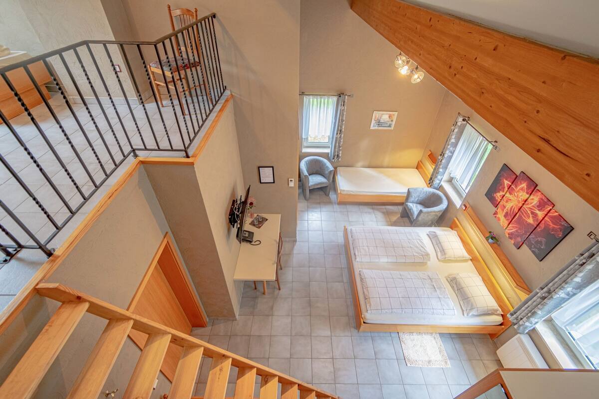 family room | 1 bedroom, minibar, desk, cots/infant beds