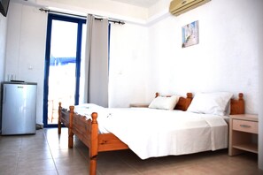 Twin Room, Balcony, Sea View | Living area | 32-inch LED TV with satellite channels, TV