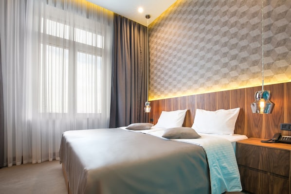 Deluxe kamer, 1 twee- of 2 eenpersoonsbedden, 1 slaapkamer | Uitzicht vanuit de kamer