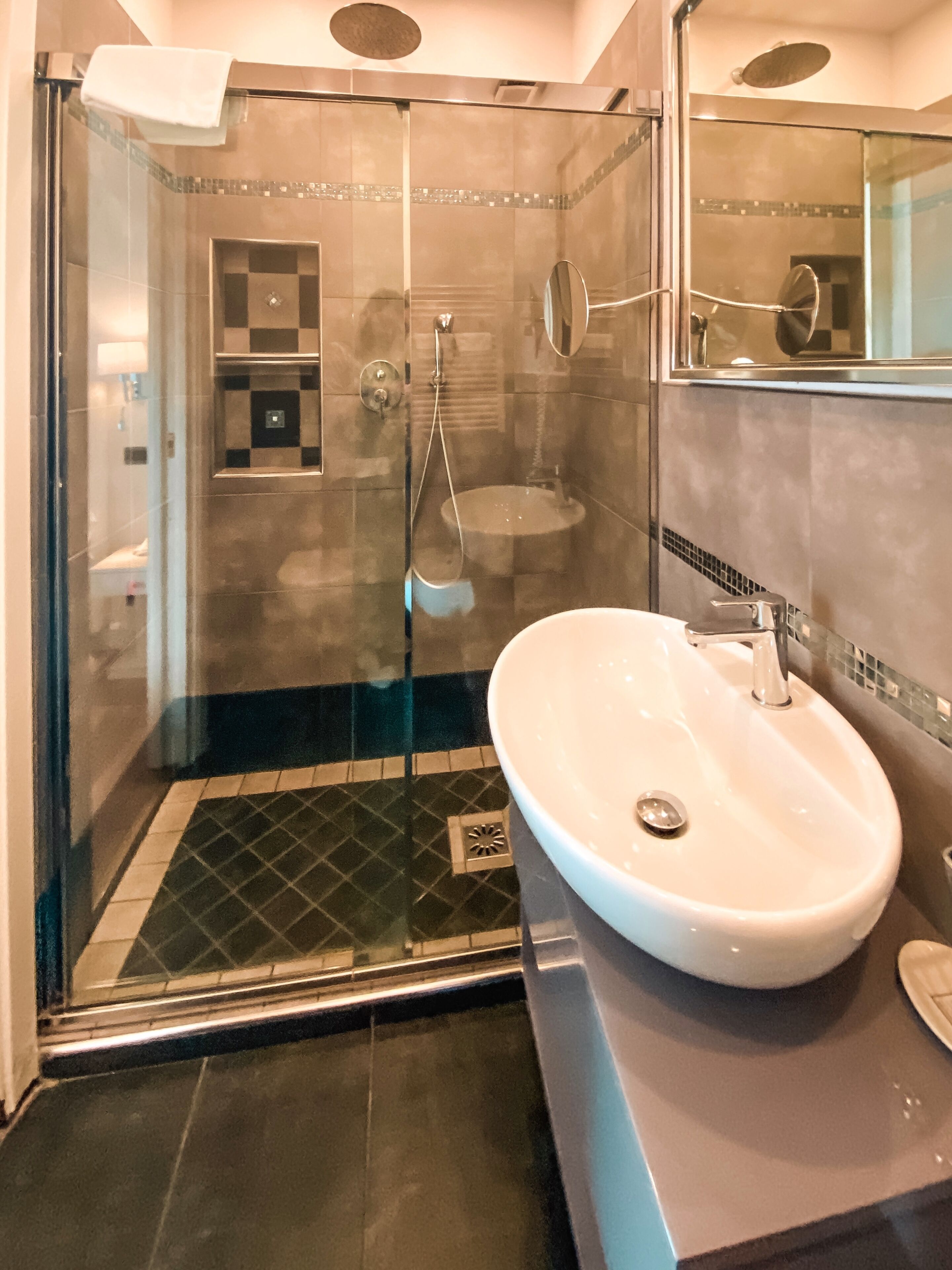 shower, free toiletries, slippers, bidet