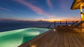 Villa (Ocean Sunset Pool) | Premium bedding, minibar, in-room safe, individually decorated
